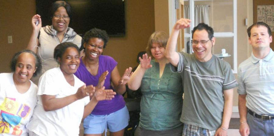 adults clapping and dancing