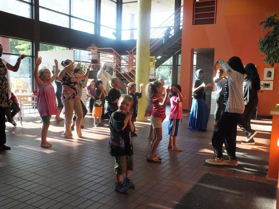 children dancing in the Pillsbury House Theatre lobby