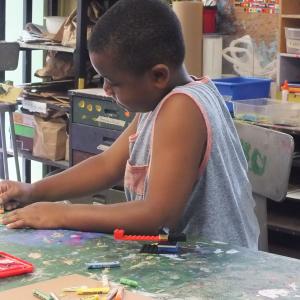 Student working on an art project