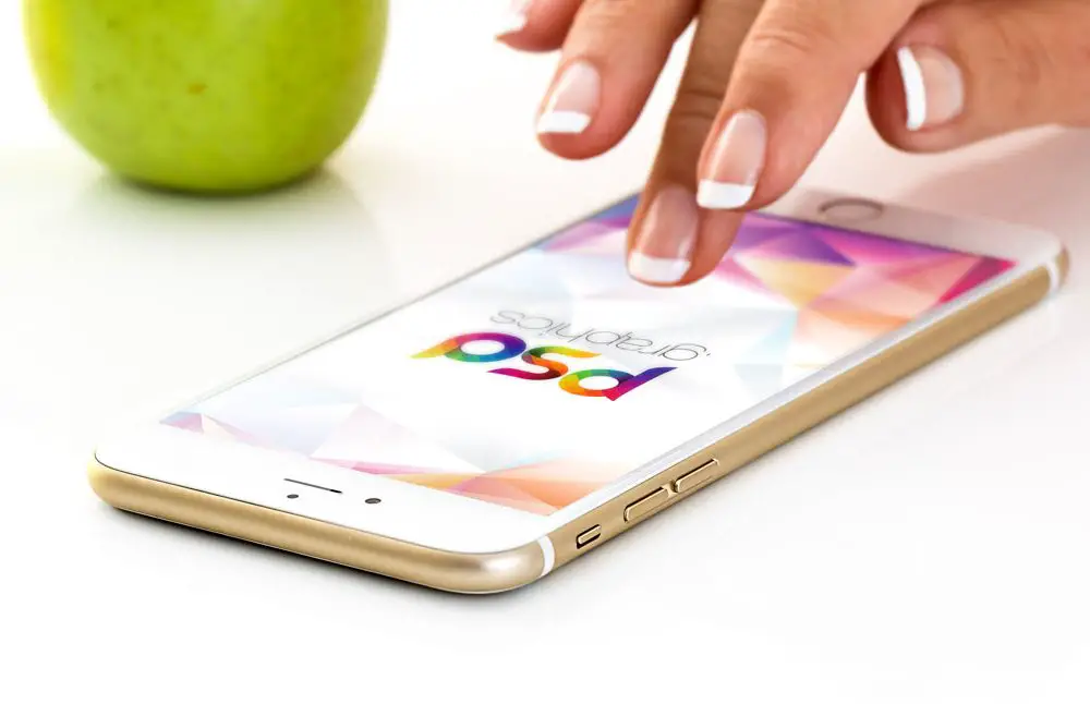 Read more about the article Golden iPhone with female Hand free PSD