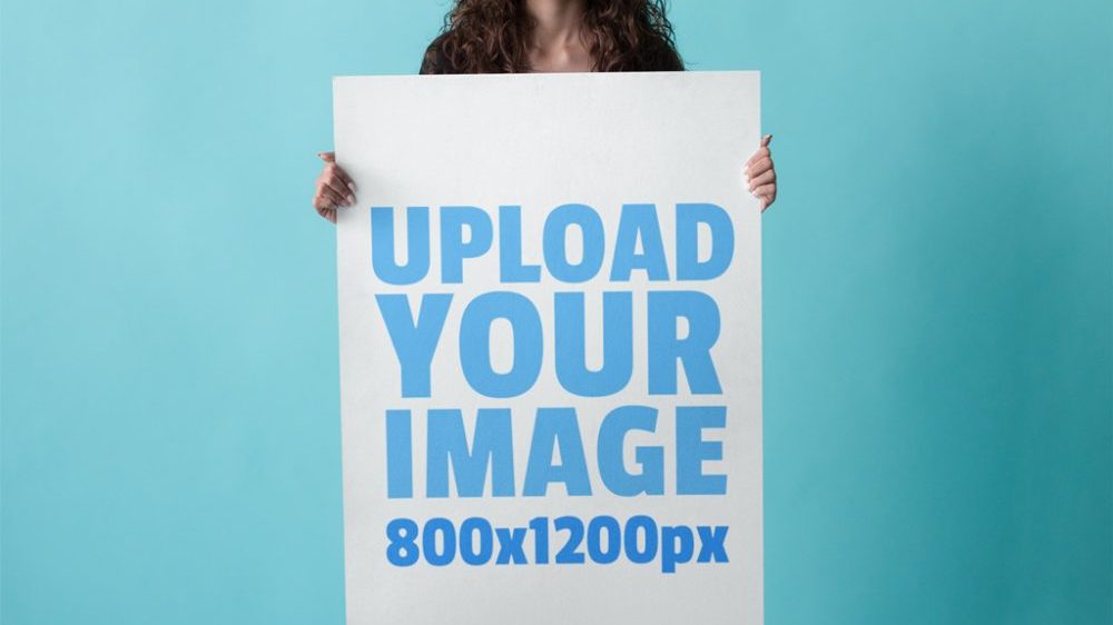 Read more about the article Woman holding Poster free PSD Mockup