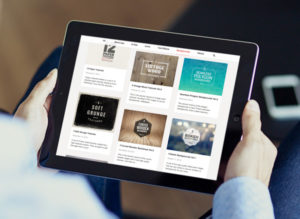 Read more about the article Man holding iPad free PSD Mockup