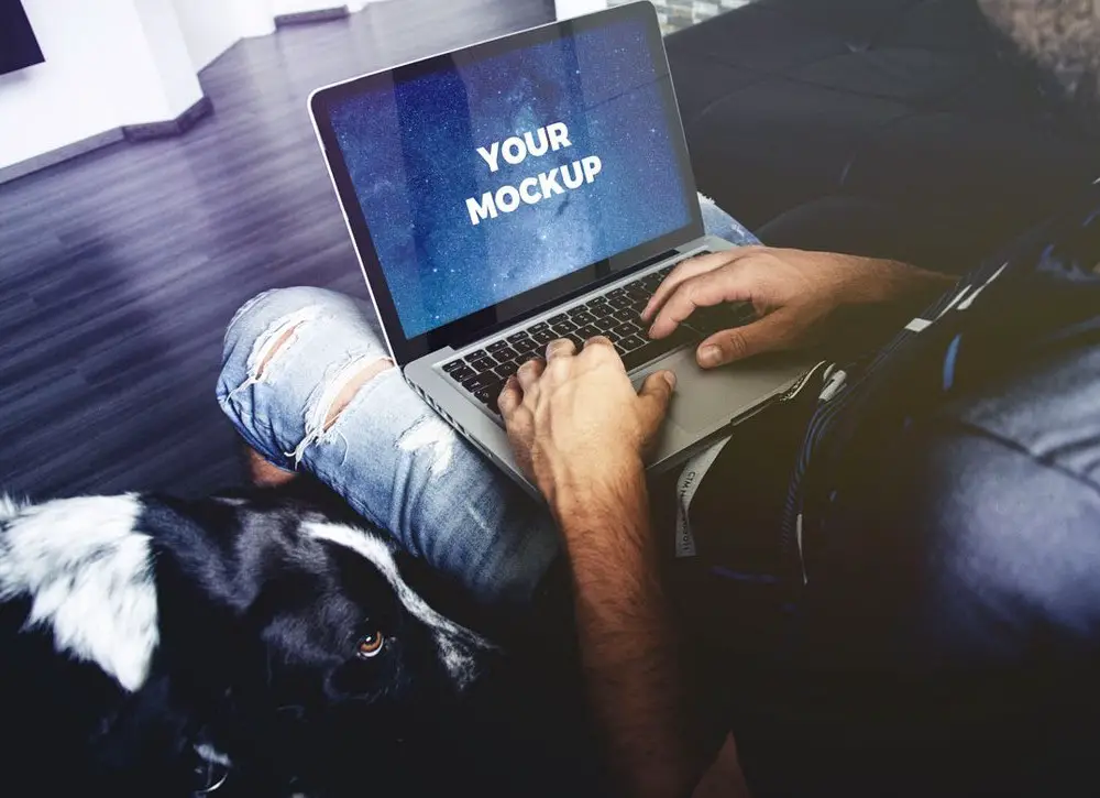 You are currently viewing man and Dog with MacBook Mockup
